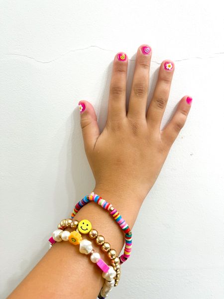 Smiley nail stickers + bracelets 

#LTKstyletip #LTKkids #LTKSeasonal