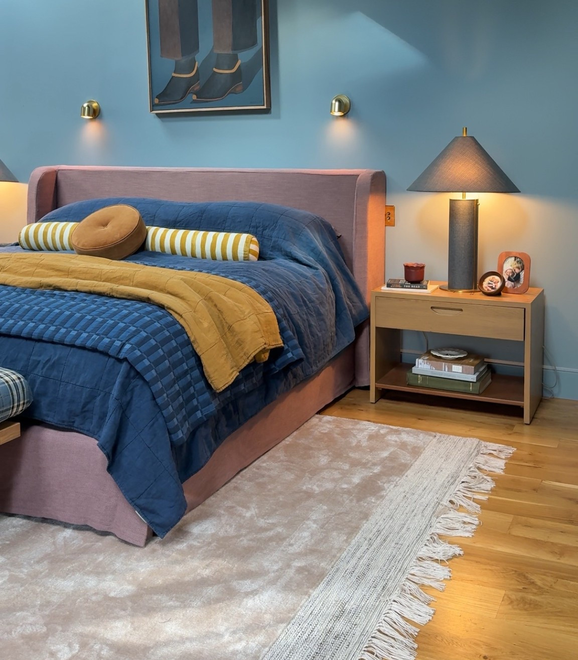 Obsessed with my new bed frame and rug. Both are from @anthropologie and the colors sing in the room. Use code EMILYH20 for 20% off! #anthropartner