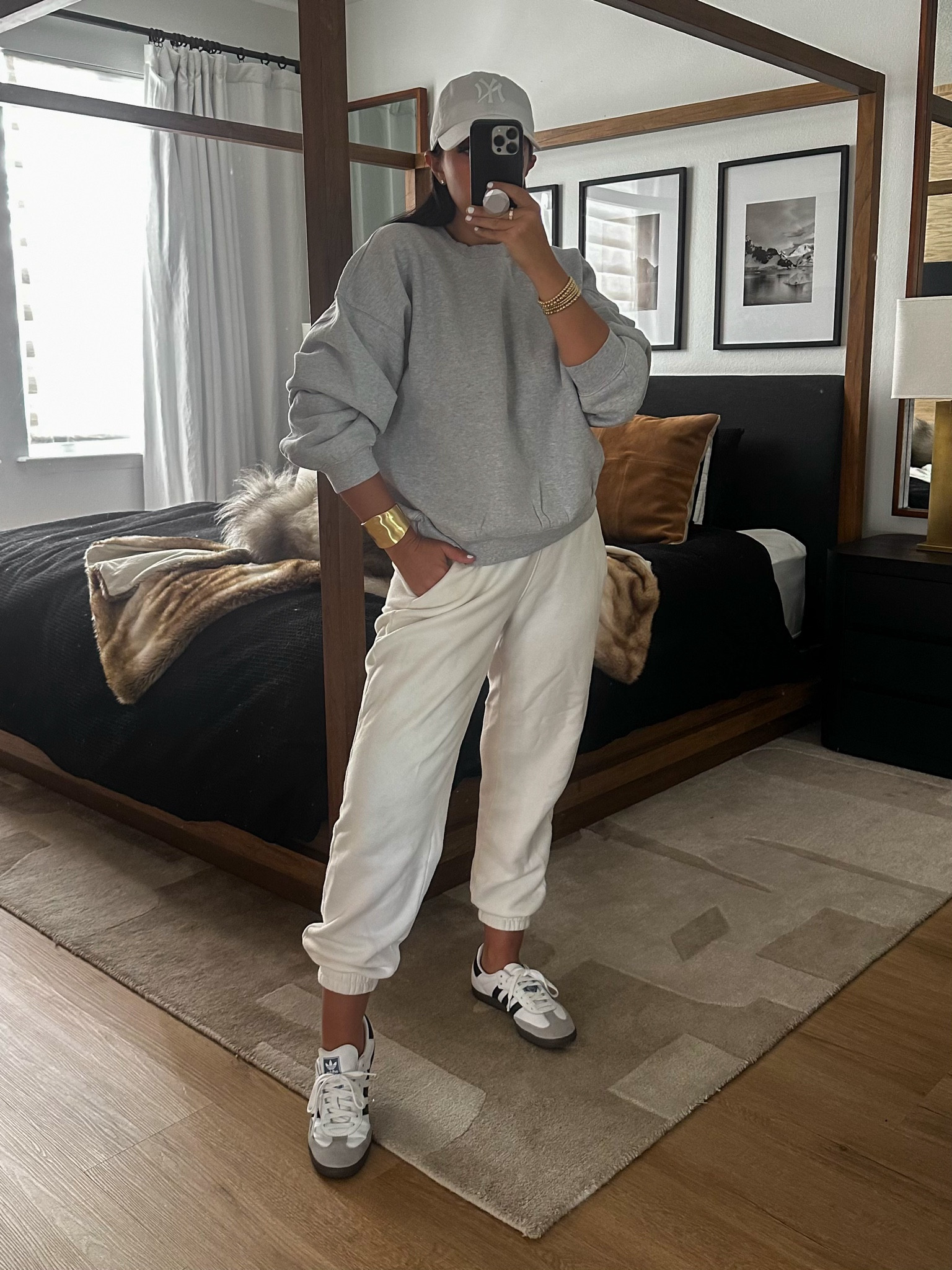 Aritzia Cozy Fleece Mega Crew Sweatshirt wearing size medium. Abercrombie Essential Sunday Sweatpant wearing size medium. Adidas Samba OGs. 
