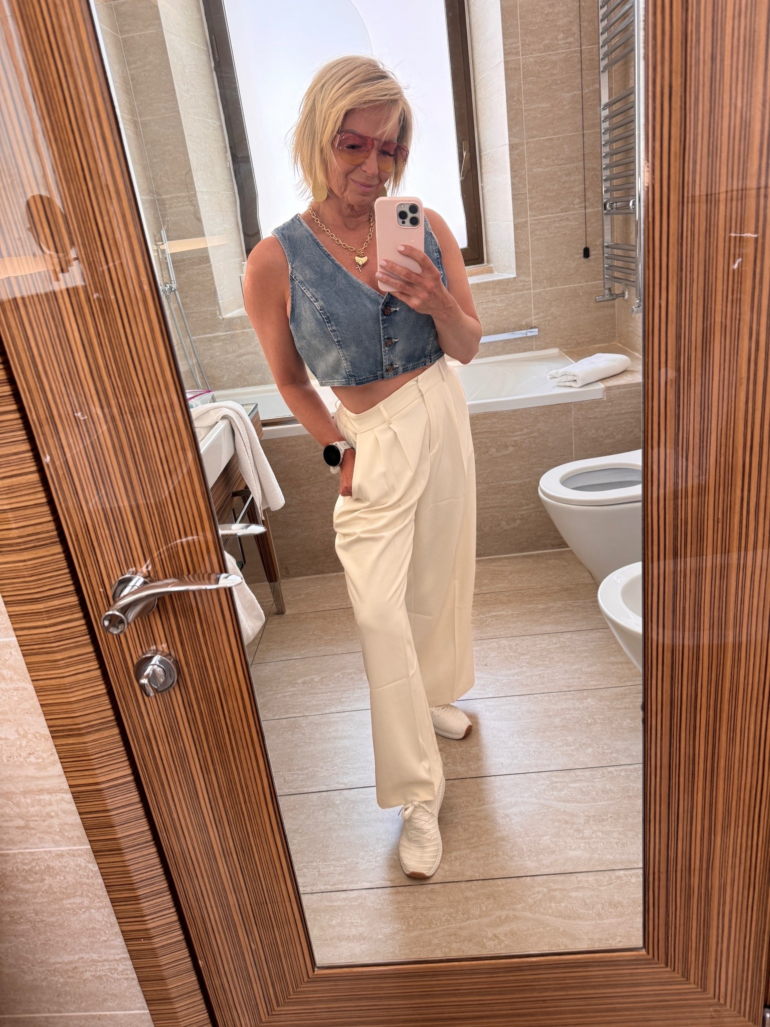Rome, I’m ready for you!
Stepping into this day of exploring in a look that’s comfy, cool, and a little bit extra—because why not?

This denim crop top + wide-leg pant combo is giving midlife modern in the best way.

I’ll be linking this full outfit in my LTK later—stay tuned, girlfriends!
You’re gonna want every piece.

#RomanHolidayVibes #MidlifeInStyle #LTKTravelLook #OOTD #ChicOver50 #ModernClassicStyle #LTKFinds #RomeOOTD #StyleInMidlife

#LTKTravel #LTKOver40