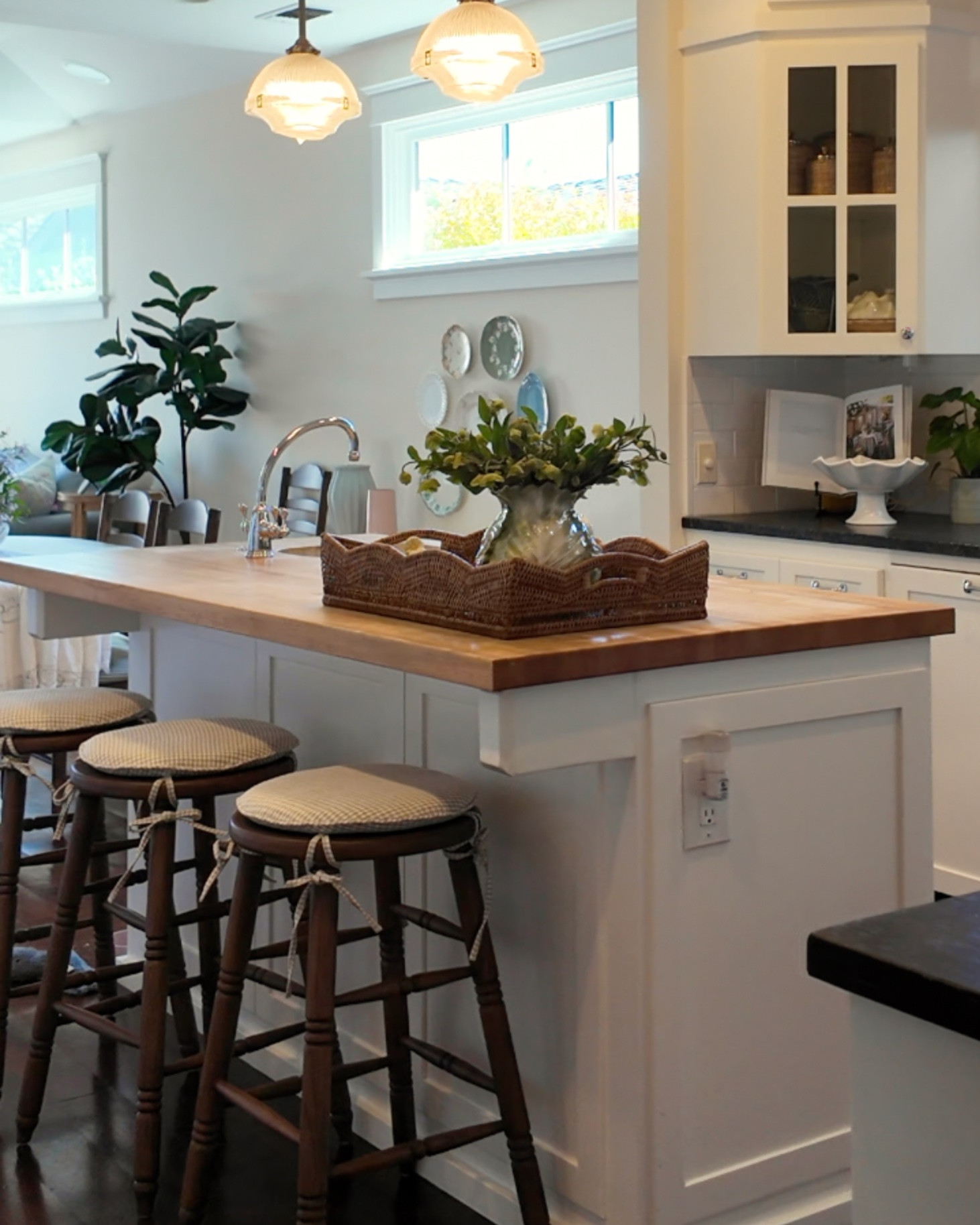 More corners of the kitchen that I love!
Check out the full home makeover process on my YouTube channel!

coastal cottage kitchen makeover, blue green and white kitchen, coastal cottage kitchen, coastal kitchen decor, coastal kitchen makeover, kitchen makeover ideas, cottage kitchen design, classic coastal kitchen, California coastal kitchen, Southern California home makeover, coastal cottage home renovation, white kitchen cabinets, white shaker cabinets, butcher block kitchen island, butcher block island countertop, wood kitchen island, white kitchen island, black kitchen countertops, dark stone countertops, white subway tile backsplash, traditional coastal kitchen, English cottage kitchen, cottage style kitchen decor, coastal kitchen styling, kitchen counter decor, kitchen island styling, rattan kitchen tray, wicker serving tray, woven basket kitchen decor, gingham bar stool cushions, wooden bar stools, kitchen island seating, potted plants kitchen decor, green kitchen accessories, blue green home decor, white kitchen styling, cottage kitchen accessories, open kitchen shelving, kitchen cabinet organization, coastal cottage interior design, interior designer home makeover