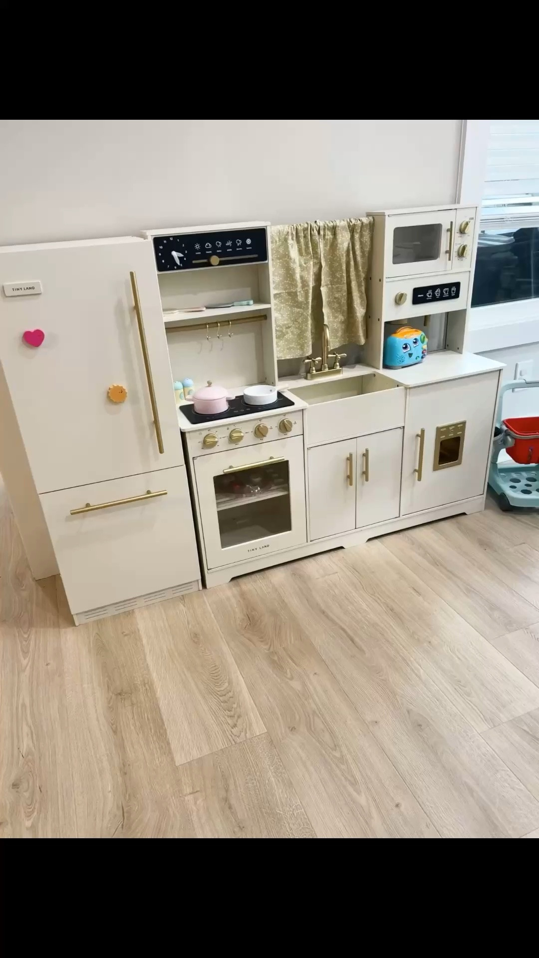 Caroline is already loving her play kitchen!! She’s 18 months old, and loves getting into everything, so naturally she loves being able to open the cabinets! The fridge, oven and cabinets serves as perfect storage, as well! End of the year sale happening now! 

#LTKmomlife #LTKGiftGuide #LTKKids