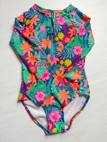 Kids swimsuit 

Come in other colors and patterns 
true to size 

Such a great affordable deal on sale, I grabbed these in multiple sizes for my daughter. 

I love the long sleeve swimsuits - especially because less skin exposed for applying sunscreen! 

#LTKSummerSales

#LTKSaleAlert #LTKKids #LTKSwim