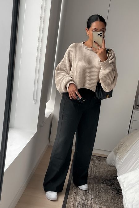 casual sweater and trousers outfit. black wide leg trouser, beige sweater, Chanel boy bag, white sneakers, neutral outfit, fall fashion, petite pants

#LTKSeasonal #LTKunder100 #LTKstyletip