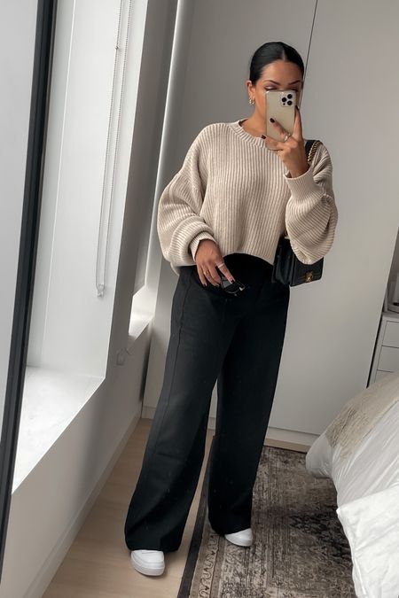 casual sweater and trousers outfit. black wide leg trouser, beige sweater, Chanel boy bag, white sneakers, neutral outfit, fall fashion, petite pants

#LTKSeasonal #LTKunder100 #LTKstyletip