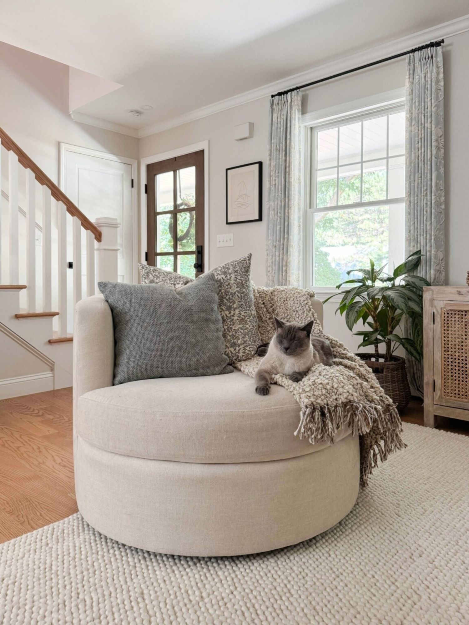 Cozy accent chair styling! A neutral corner layered with plush seating, soft pillows, and warm textures for a relaxed coastal feel. Accent chair styling, neutral living room decor, cozy home corners, coastal neutral style, textured pillows, timeless home design, Sherri calnan home

#LTKmomlife #LTKKids #LTKHome