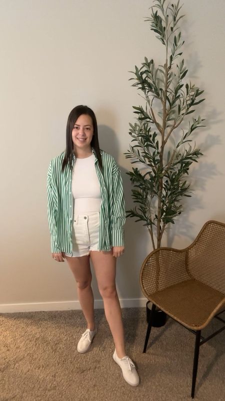 St. Patrick’s Day outfit inspiration. This button down from Petal & Pup is on major sale! I have it paired with white shorts and white sneakers from Target and a white contour tank top from Express! Entire outfit fits TTS!

#LTKsalealert #LTKstyletip #LTKSpringSale