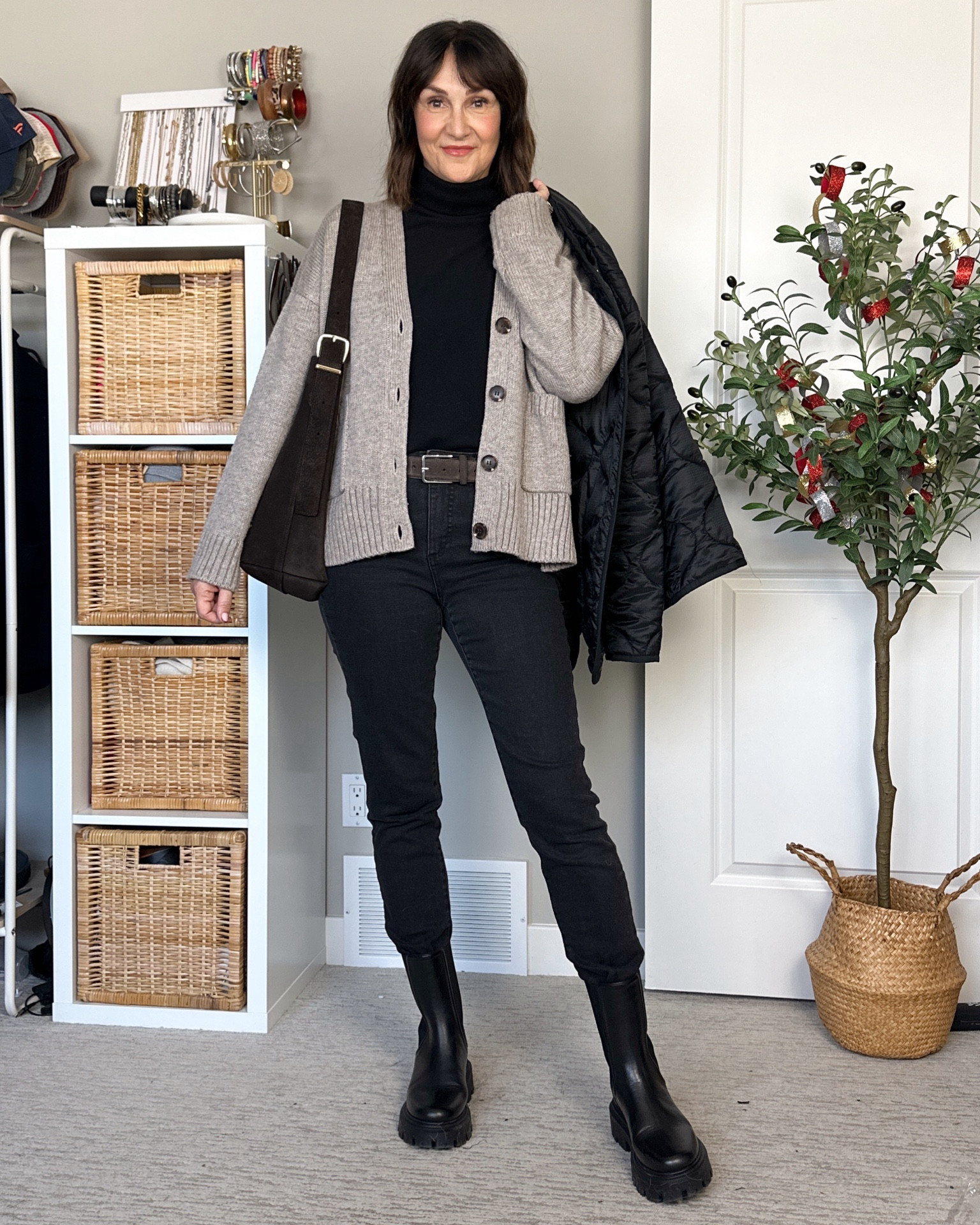 What I wore to pack Christmas gifts for Santa’s Anonymous! Jeans are the perfect update skinny style, slim without being too tight and fit tts. Use my code CBSTYLED15 for an additional 15% off! 
Wearing my usual S in the cardigan (sold out in this shade but I linked similar) and sized up to M in the fleece turtleneck, it’s a slimmer fit and I prefer more room. Suede bag is one of my most worn, it’s really nice quality. Suede belt fits tts.
Boots and quilted jacket are from last year but I’ll link similar 


#LTKStyleTip #LTKItBag #LTKFindsUnder100