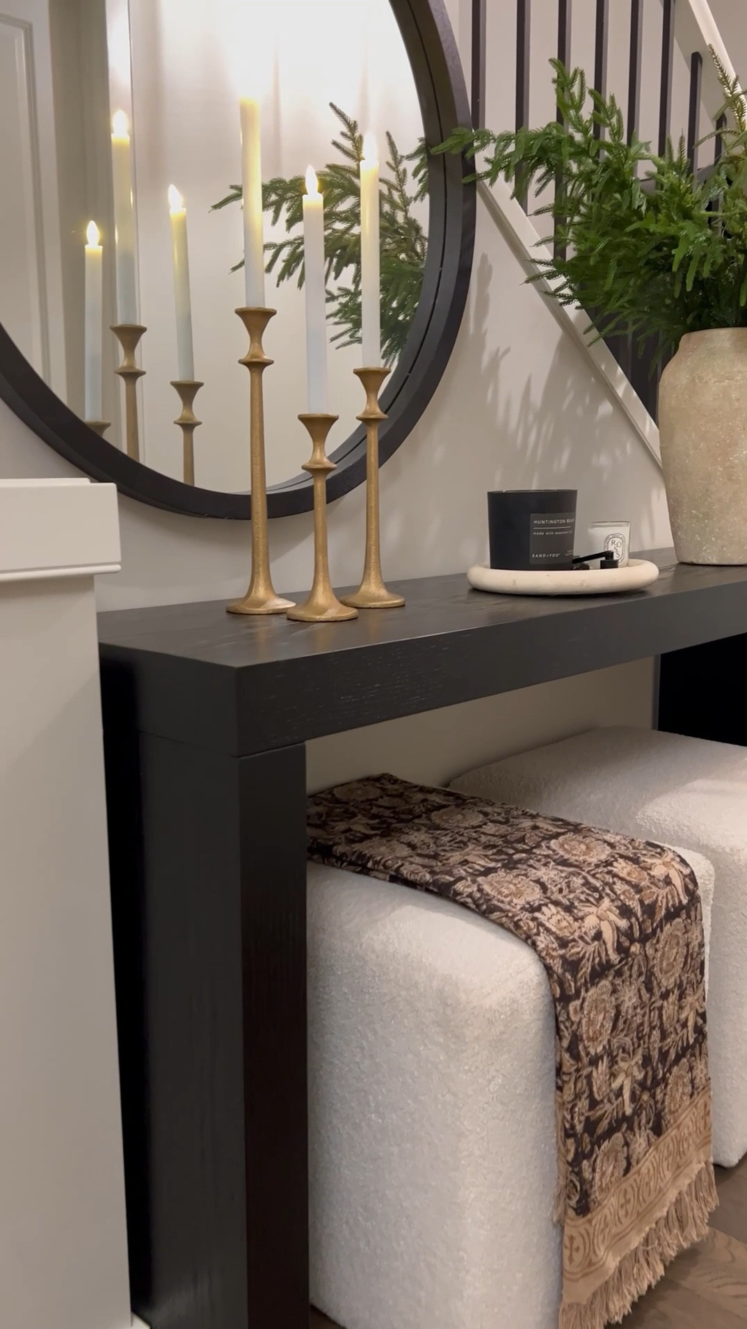 Christmas is just around the corner can you believe?! 😆 I styled this cream ceramic vase with Norfolk pine stems. These sell out fast so hurry and grab yours! 😜 …

Black console table
Round black mirror
Set of 3 candle holders #LTKVideo 

#LTKHoliday #LTKStyleTip #LTKHome