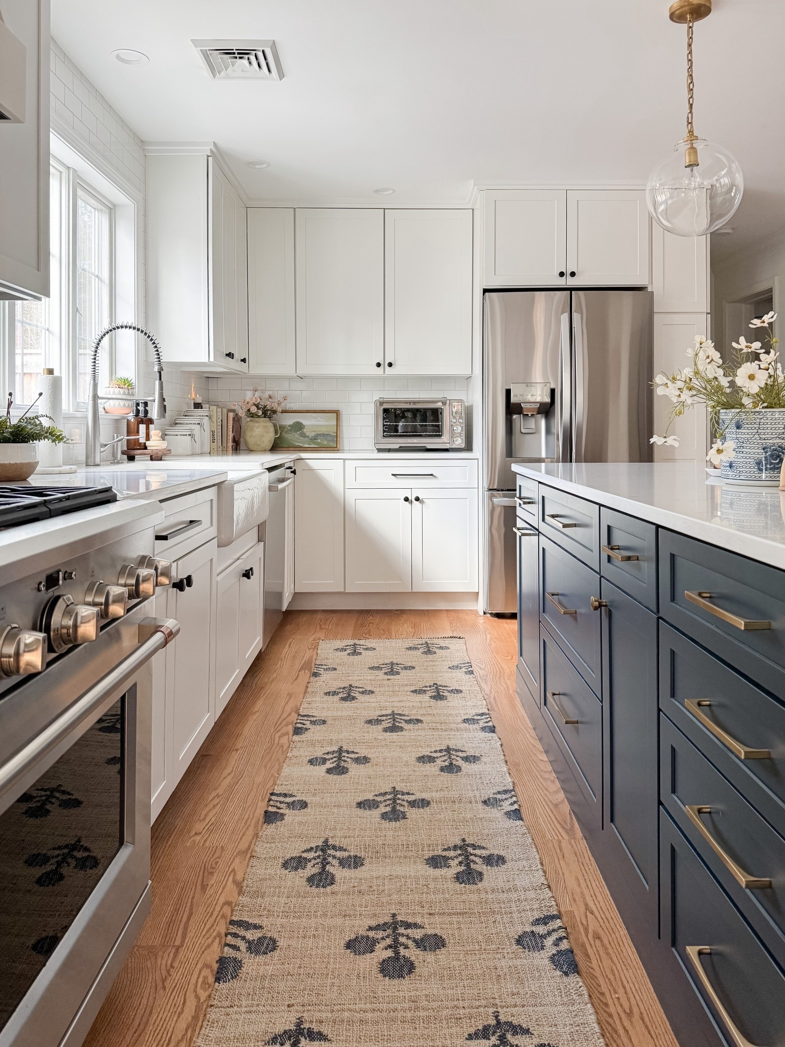 Coastal kitchen styled with navy island, white cabinets, neutral runner rug, and simple kitchen decor for a light and layered coastal space.

coastal kitchen decor, navy kitchen island, neutral kitchen runner rug, white cabinet kitchen, coastal kitchen styling, neutral kitchen decor, light coastal kitchen design, kitchen island runner rug, sherricalnanhome

#LTKHome