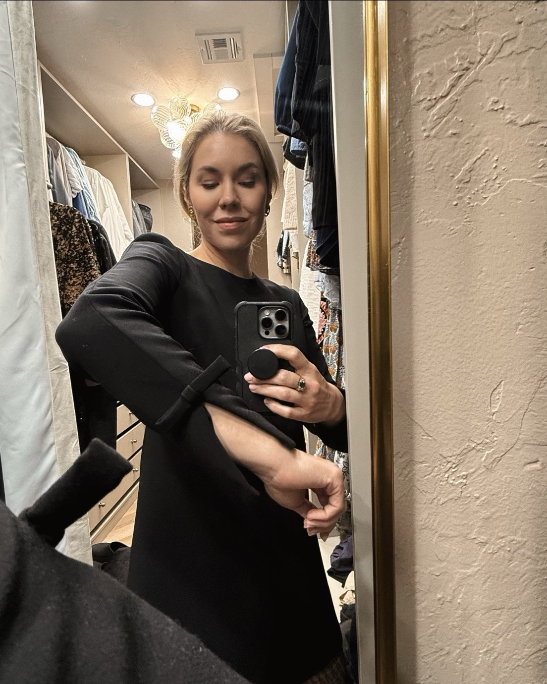 A simple black dress with bows details on back and sleeves 

#LTKHoliday #LTKSaleAlert