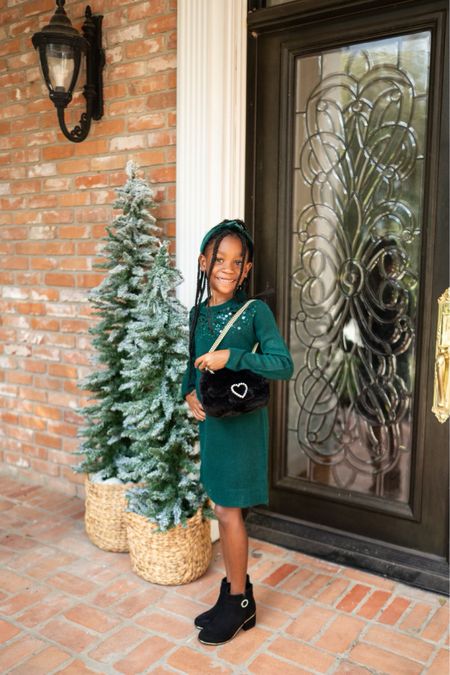 Holiday outfits/ girl sweater dress and black boots 

#LTKHoliday #LTKGiftGuide #LTKkids