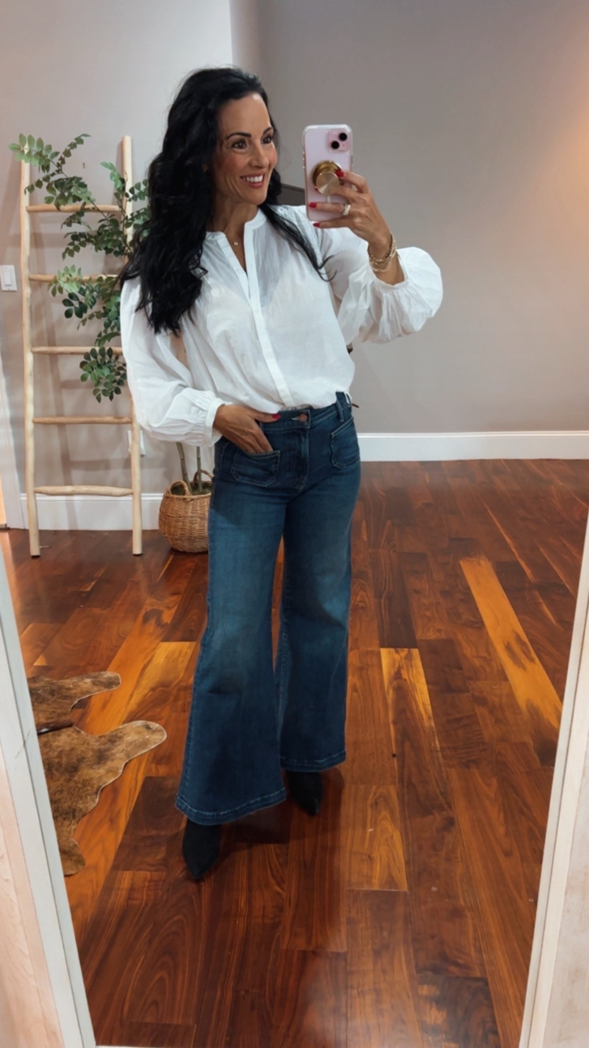 Petite denim jeans with a balloon sleeve blouse 

#LTKootd #LTKspringtrends #LTKspring