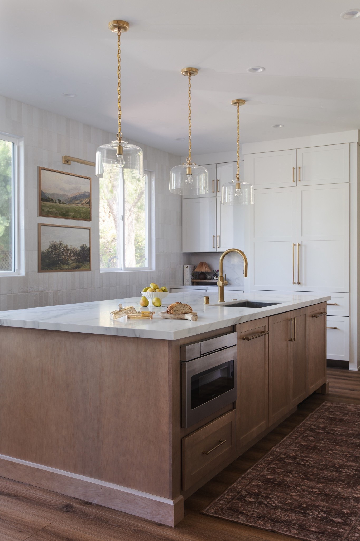A beautiful transitional kitchen design with modern lines and dash of world charm. 

#LTKHome