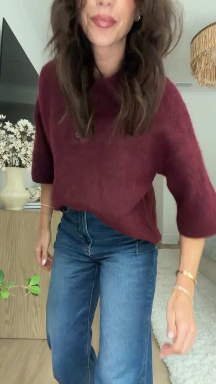 This new burgundy sweater is such a good find for fall. I love the rich color, relaxed sleeves, and button detail at the neckline. Paired with wide leg jeans, it's an easy everyday outfit that still feels put together.
burgundy sweater, fall sweater, button neck sweater, burgundy knit top, wide leg jeans, fall outfit, casual fall style, women's sweaters, fall fashion, everyday outfit, sweater and jeans outfit, annabrstyle