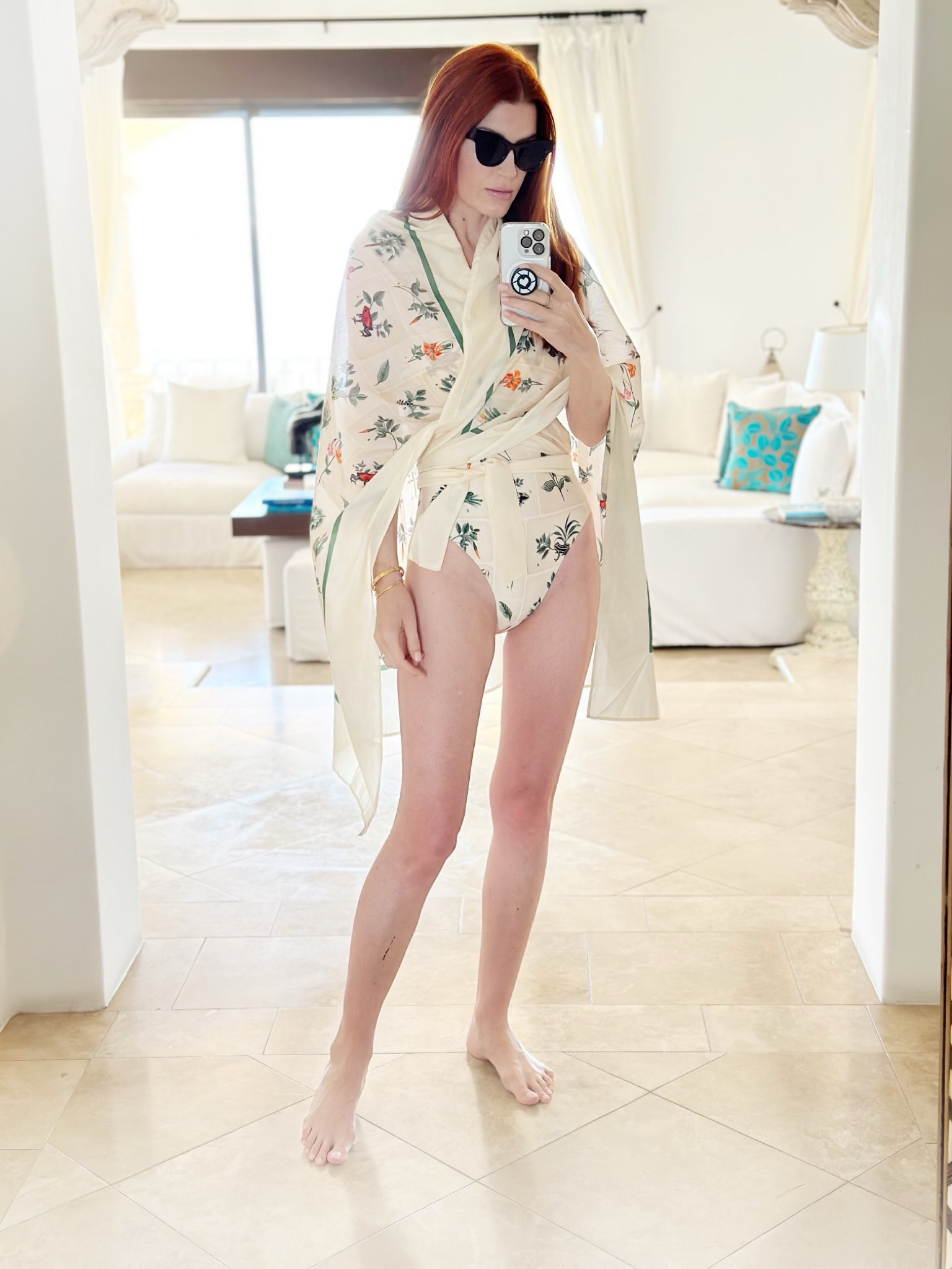 I always pack a pareo in my suitcase for beach vacations. I’m wearing mine like a top here to help keep the sun off my shoulders, but there are so many different ways you can style.
This is one is last season, but this Colombian brand makes the same version each season in a variety of beautiful prints. 

#LTKswim #LTKstyletip #LTKtravel