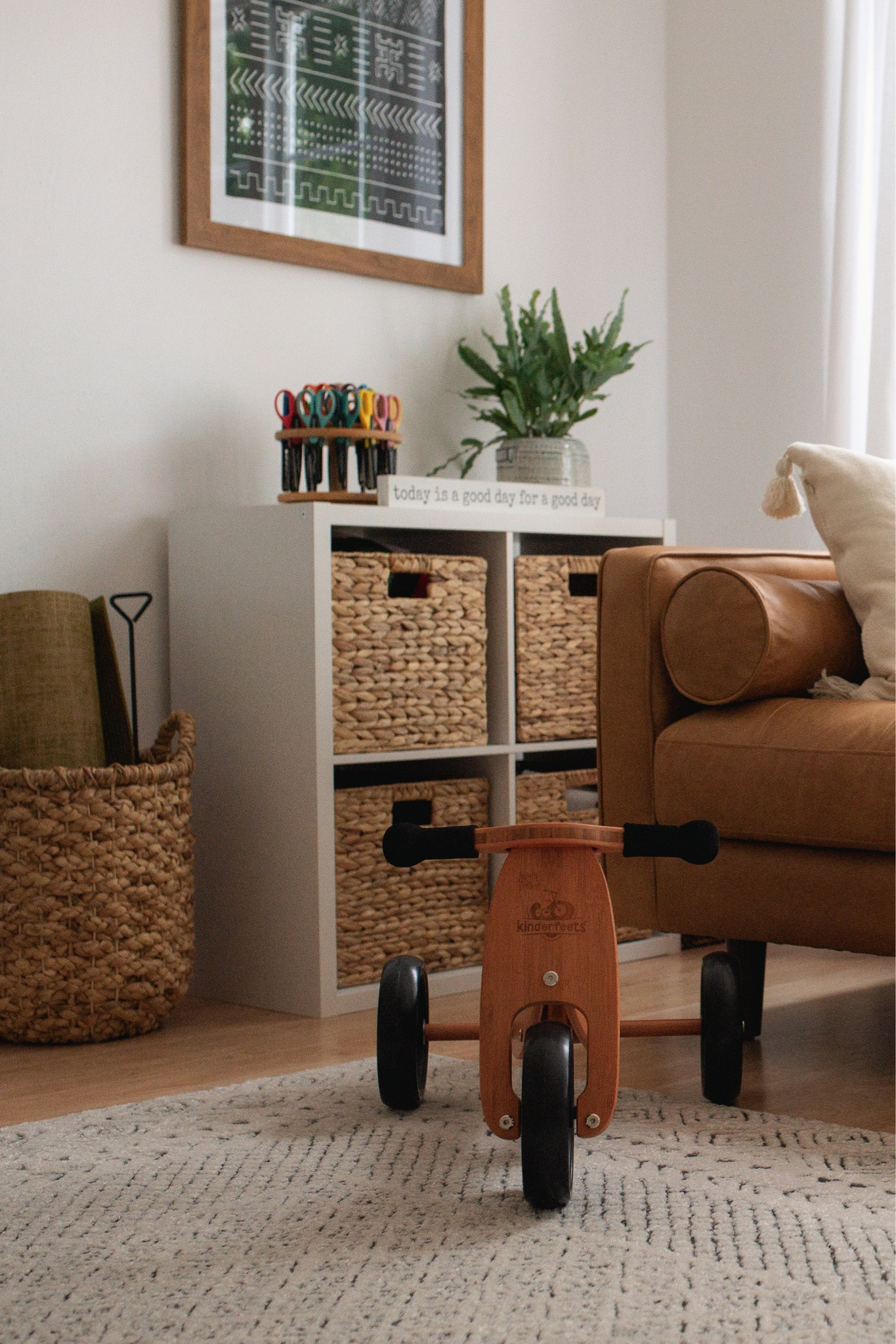 Original leather couch is from Article. 👌 But this Kinderfeets bike is a fan favorite in our household!

office playroom ideas, home office with play area, boho living room style, minimalist living room decorations, tribal area rugs, bohemian rug, leather couch, toy organizationn

#LTKkids #LTKhome #LTKfamily