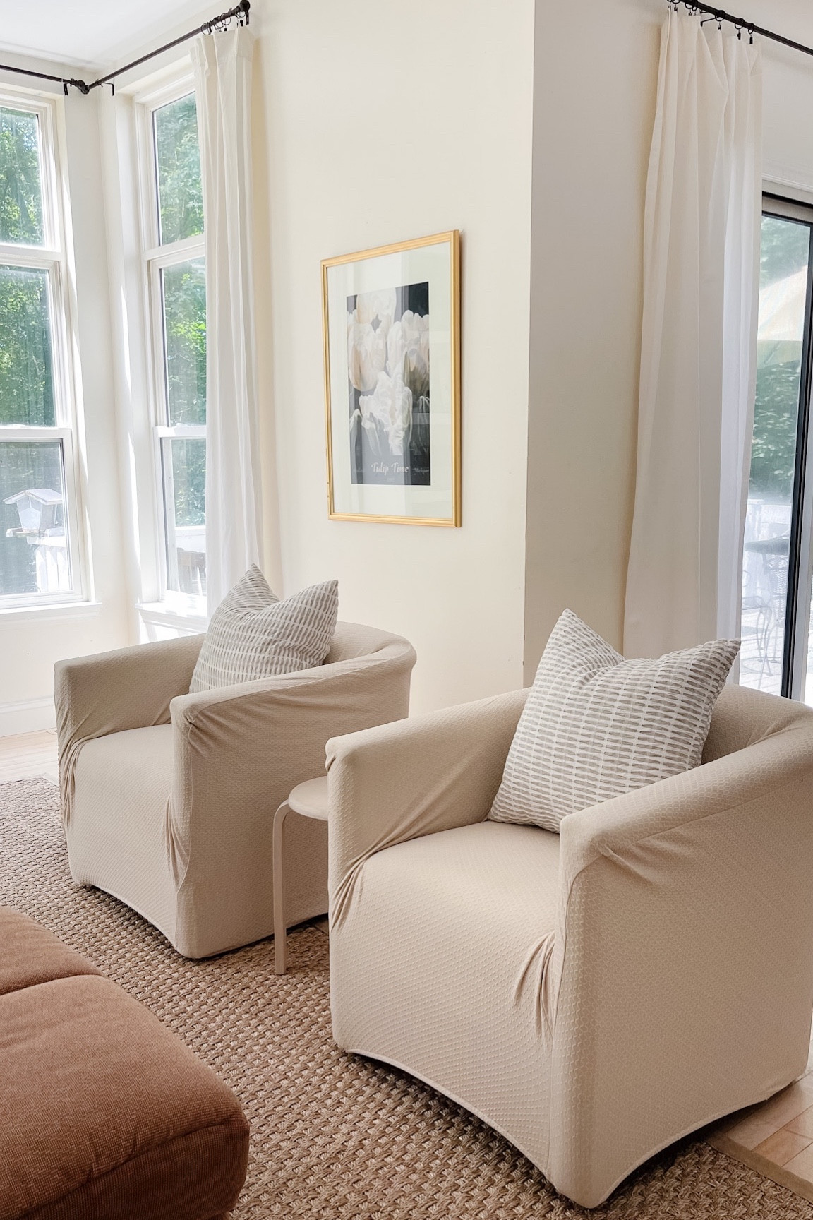 Our family is filled with affordable finds. Extra long cotton curtains, sisal rug, chair slipcovers and textured pillow covers. 

#LTKunder100 #LTKhome #LTKFind