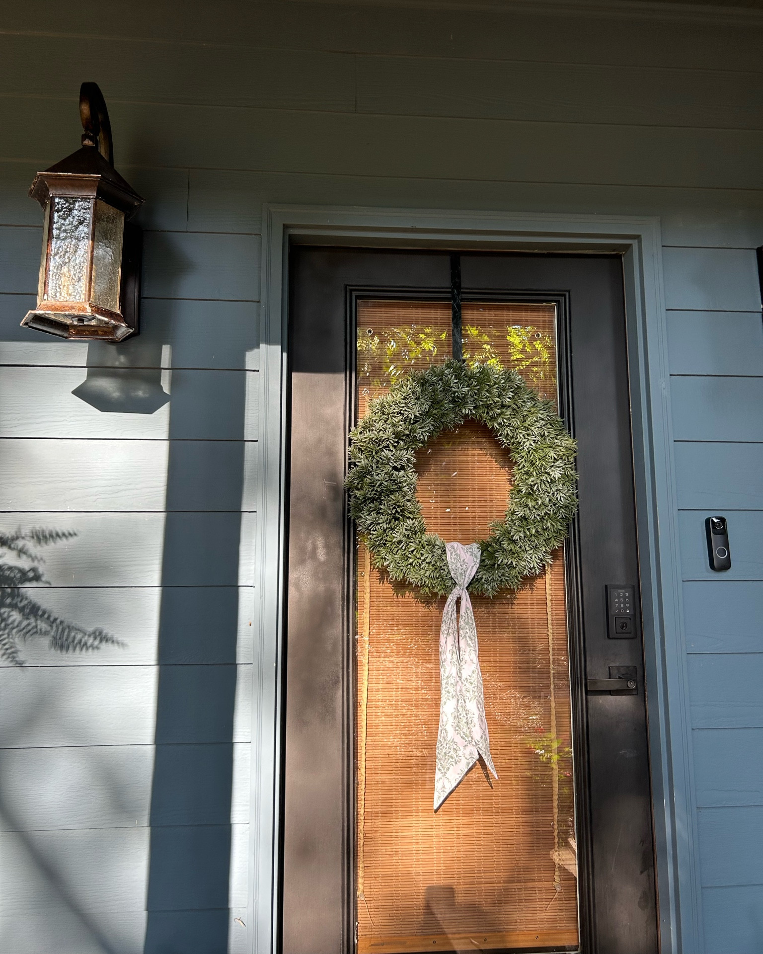 It wouldn’t be a front porch in the south without a boxwood wreath and  wreath sash. 🏡🪴

Southern front porch, Etsy, front porch wreath 

#LTKHome