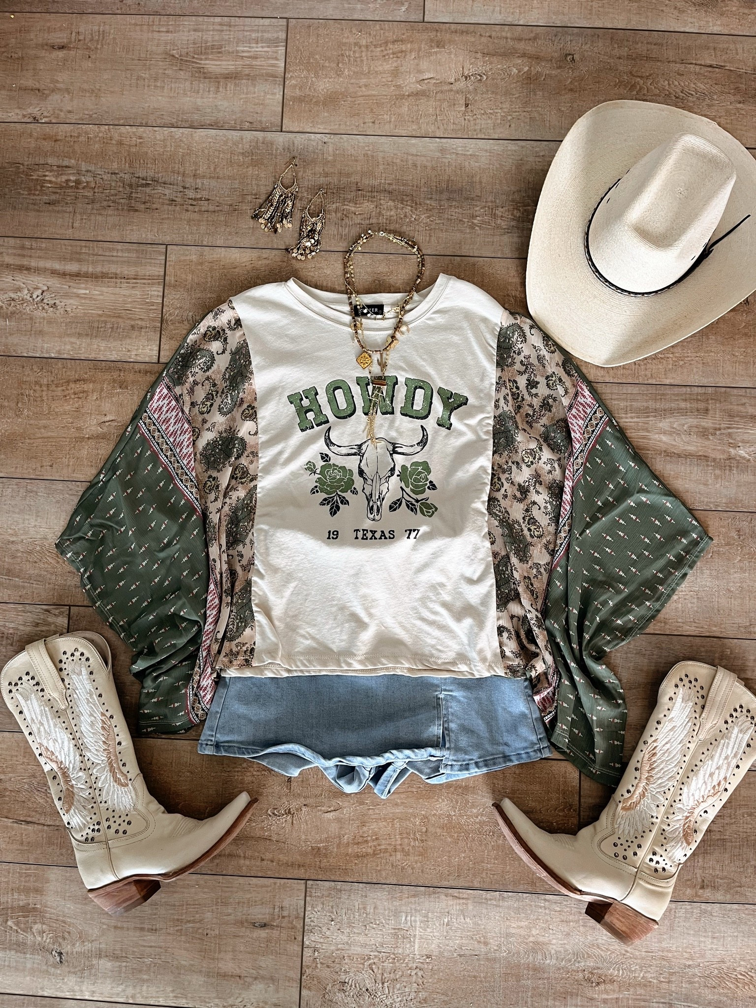 A fun girly cowgirl look with bohemian accents! The flowy sheer sleeves are so pretty! Love the greens 💚 code LORI to save on skort

#LTKootd #LTKgrwm #LTKSeasonal