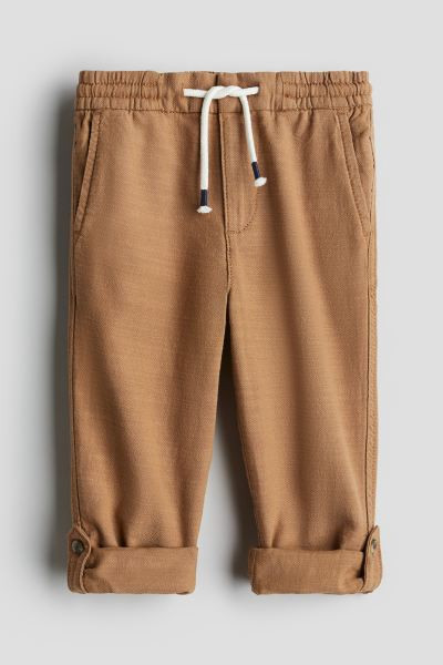 Loose Fit roll-up trousers | H&M (UK, MY, IN, SG, PH, TW, HK)