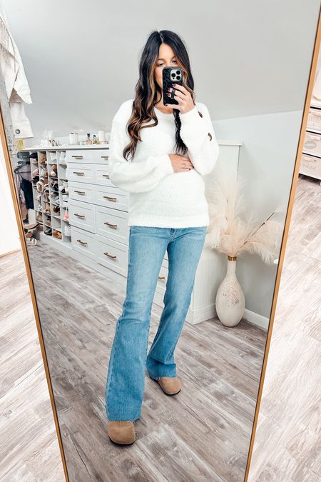 Maternity flare jeans and fuzzy white sweater 

#LTKbump #LTKCyberWeek #LTKSeasonal