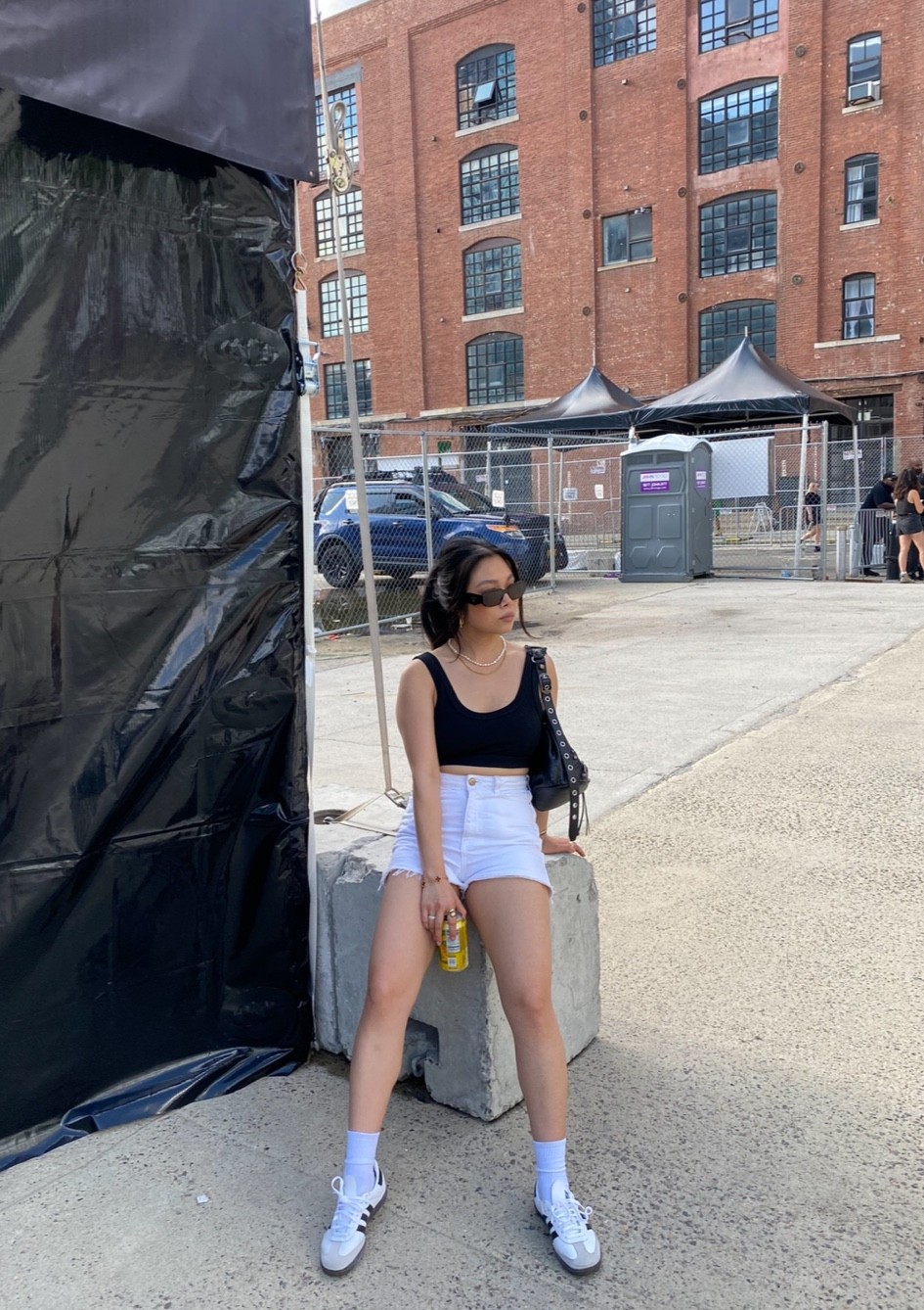 Casual look, wearing an Alo top and a white denim short pairing it with the white samba’s for a sporty look 