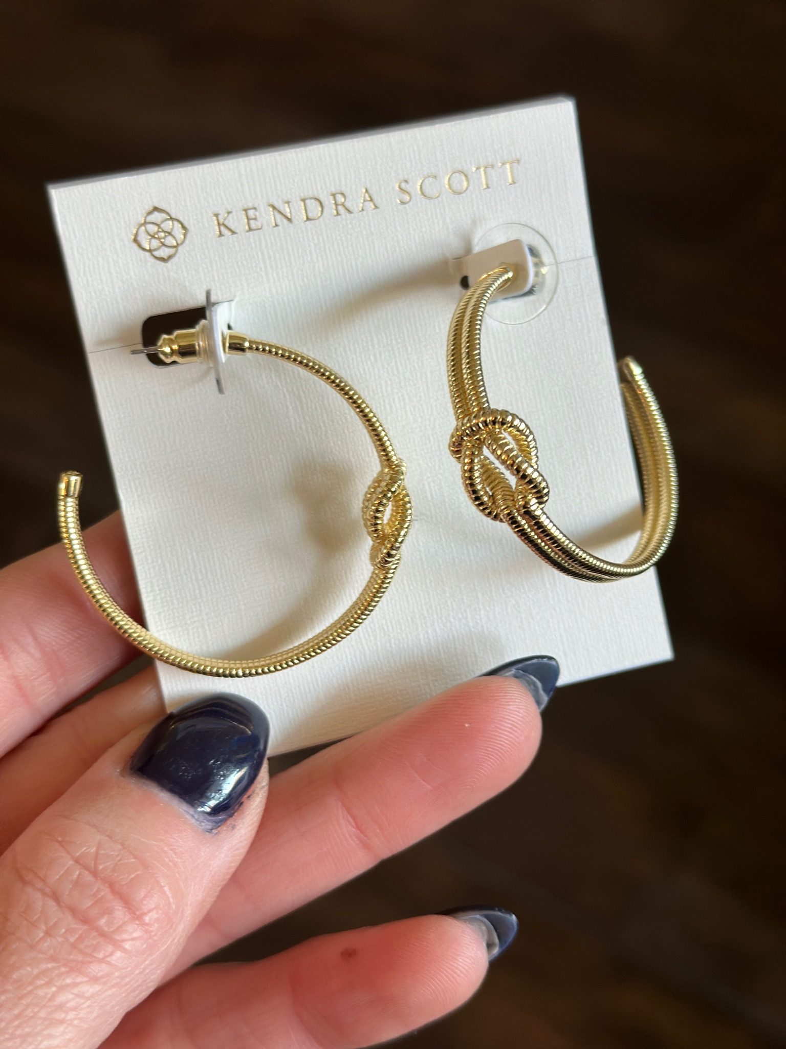 I love a good pair of gold hoops and I love the knot detail on these from Kendra Scott. 