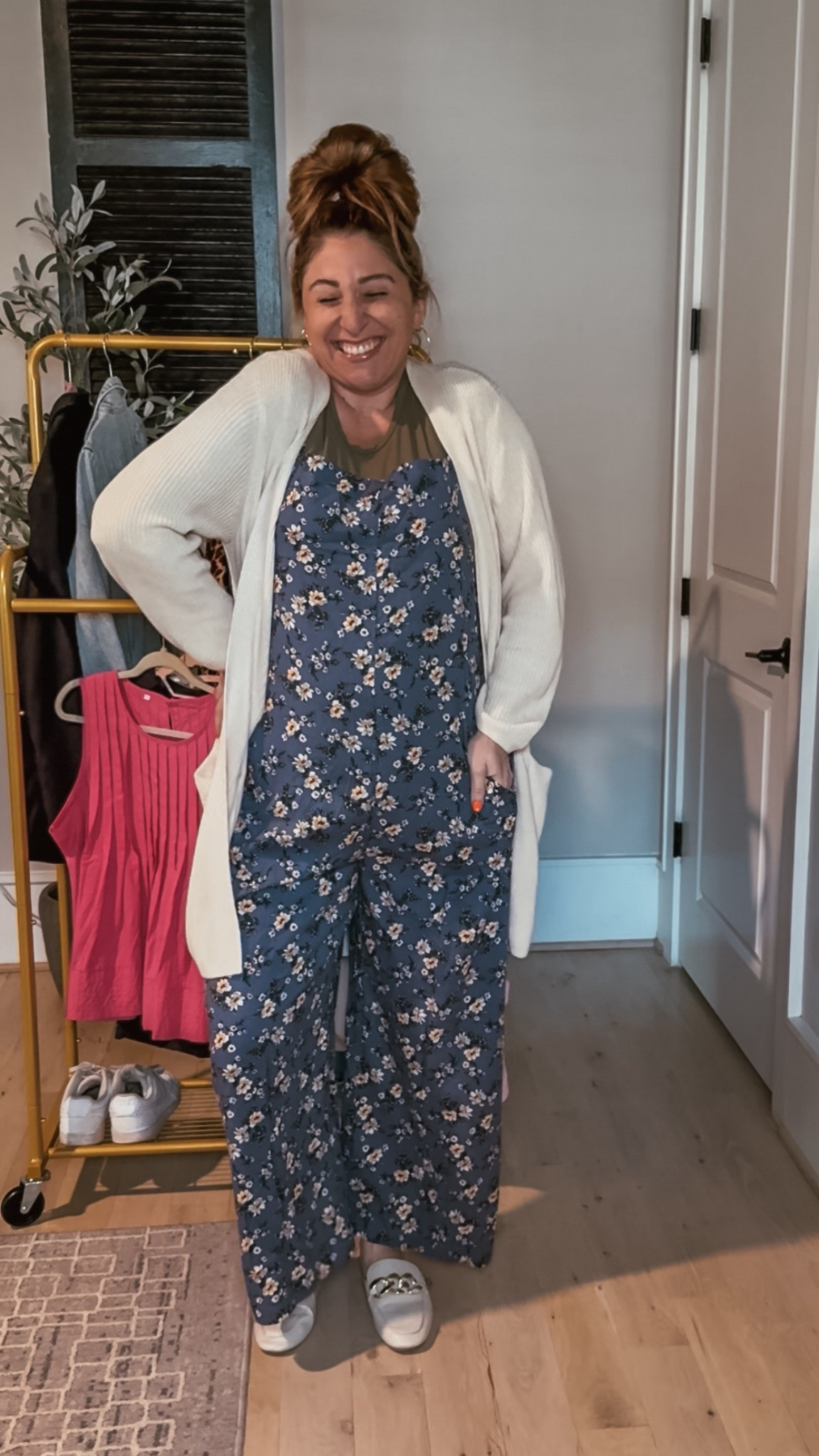 Day 4/10 of teacher wardrobe must haves!! This jumpsuit is amazing in every way! Dressier material, pockets, comfortable, and a floral pattern/color that works all year round! Paired it with the bodysuit to make it “school appropriate” and layered with the cardigan for those chilly classroom temperatures! Pulled the ivory from the sweater into the mules! A perfect “outfit sandwich” if you ask me?! Lol 

Bodysuit XL / Jumpsuit XL / Cardigan L / Miles tts 

#LTKWorkwear #LTKSeasonal #LTKMidsize