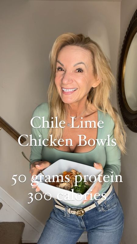 CHILE LIME CHICKEN BOWLS- 50 grams of protein, 300 calories 

1 pound boneless skinless chicken breast

2 teaspoons chile lime seasoning 

1/2 fresh lime

Place chicken in small crockpot and sprinkle with chile lime seasoning. Cook until easy to shred with a fork (about 4 hours on high or 8 on low.) 

Shred and squeeze lime juice on top. 

Makes 2 large servings 250 calories and 50 grams protein.

Serve on top of cauliflower rice and add any toppings you like. I kept it simple with fresh lime, cilantro and a bit of mango habanero salsa.

xoxo
Elizabeth 








#LTKVideo #LTKover40 #LTKhome