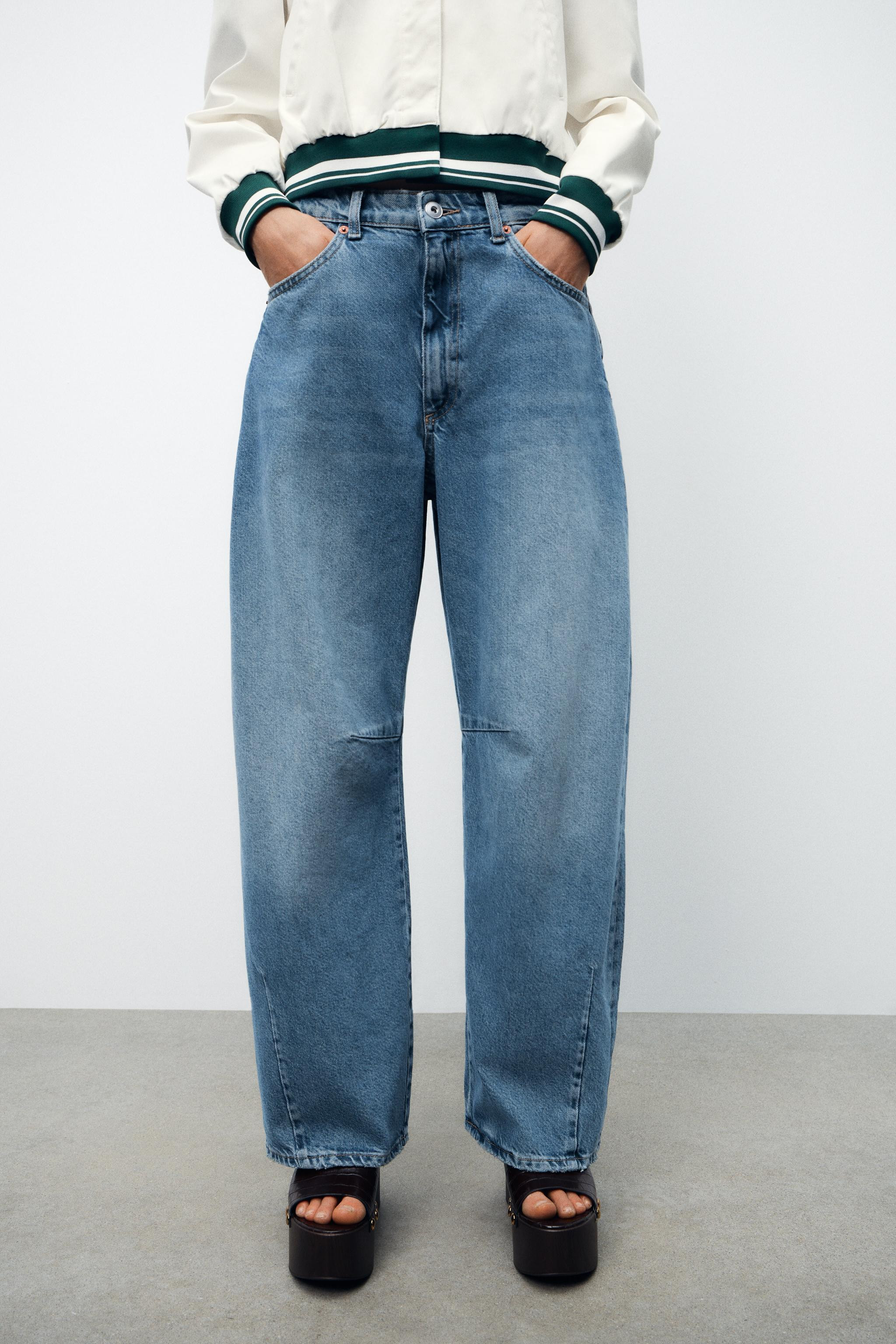 MID WAIST - BAGGY BALLOONJeans with a mid waist and five pockets. Twisted seams. Front zip and me... | Zara US
