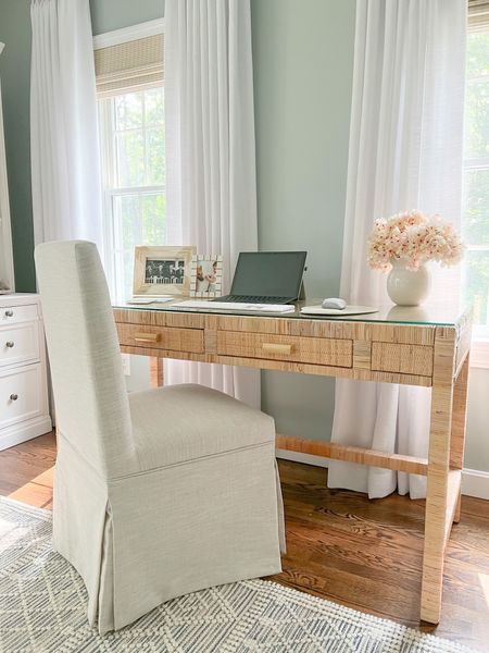 While my own desk is no longer available, this woven desk from Amazon is SO similar! I actually love the Amazon desk more, with its brass capped feet and it's a great price for such a high-end look! 

Coastal home office, home, home office, neutral office, neutral home, coastal home, coastal style, neutral style, beach house, beach home decor, coastal interiors, woven wood shades, brass line photo frames, coastal frames, pottery barn bookshelf, apple Magic Mouse, wireless mouse, leather oval mousepad, curtain rod, linen curtains, drapery panel, white ruffle vase, wood beaded chandelier, natural rattan desk 

#LTKstyletip #LTKfindsunder50 #LTKhome