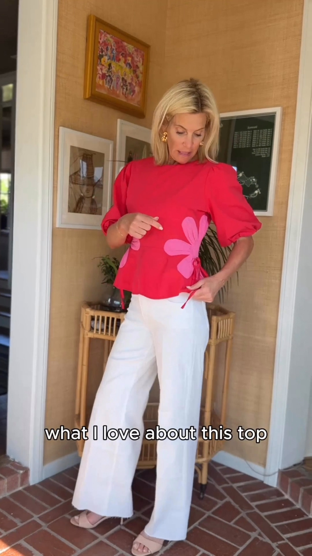 Bold floral top with neutral wide-leg pants for a balanced outfit.

#LTKootd #LTKSaleAlert #LTKOver40