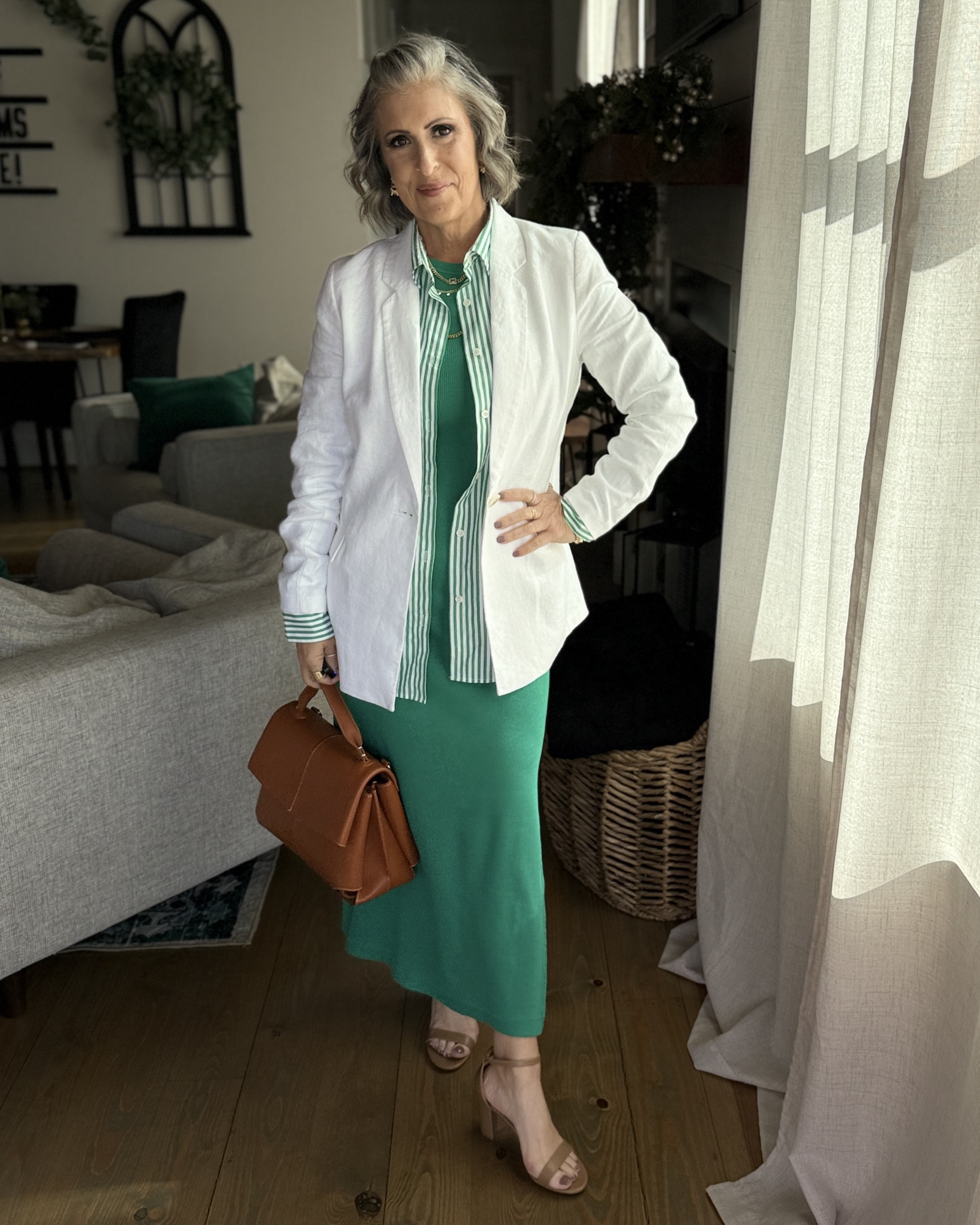 My Elevated Style Girlies — One dress, 7 ways—because every great style story starts with a versatile base! Today’s look is all about this green maxi dress from Target, styled with sneakers, flats, and heels to show how layering + shoes totally transform a look. Whether you’re running errands or heading to brunch, this outfit adapts with ease!

📝 Breakdown Style Story #5:
* Perfect Starter: This maxi dress acts as a blank canvas for styling with shirts, jackets, blazers, and accessories. Offers versatility. Stylish yet comfortable. From day to night with a simple switch of the shoes. Bonus its extremely budget friendly.
* Shoes: Strappy block heel sandals from Amazon add height and elegance.
* Layering: White linen blazer over the striped shirt transforms the dress into a polished workwear option.
* Accessories: Tan structured Amazon handbag completes the look with warmth and sophistication.
* Style Vibe: Business casual, spring events, or stylish church look.

✨Why it works: Strategic layering creates clean lines, while the neutral heels elongate the leg and tie everything together.

✨Every piece in your wardrobe serves a purpose, and every outfit tells a style story. Be intentional, be confident and create a style story you’ll love!✨

#LTKFindsUnder50 #LTKOver40 #LTKStyleTip