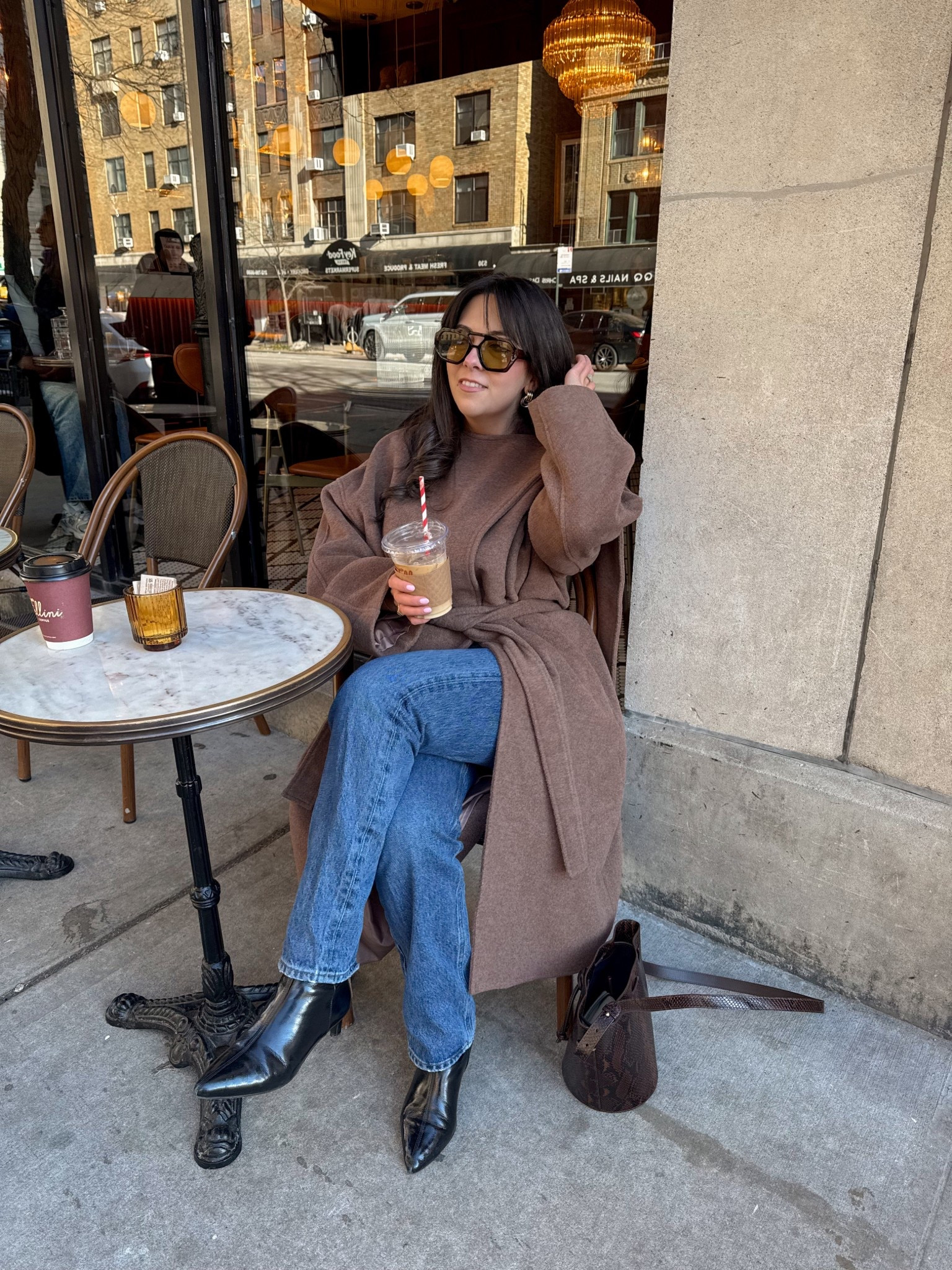 an easy, elevated winter outfit 🤎 This belted wool coat is the perfect throw-on for NYC days, styled with a cozy brown sweater, classic straight-leg jeans, and sleek black pointed-toe ankle boots. Finished with oversized sunglasses and a chic shoulder bag for a polished coffee-date look. Cozy, timeless, and so wearable for everyday winter outfits. 

#LTKSeasonal #LTKootd