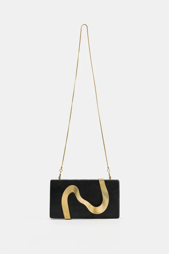 Clutch bag. Metal detail serving as a top handle. Metal chain shoulder strap. Interior pocket. Ma... | Zara US
