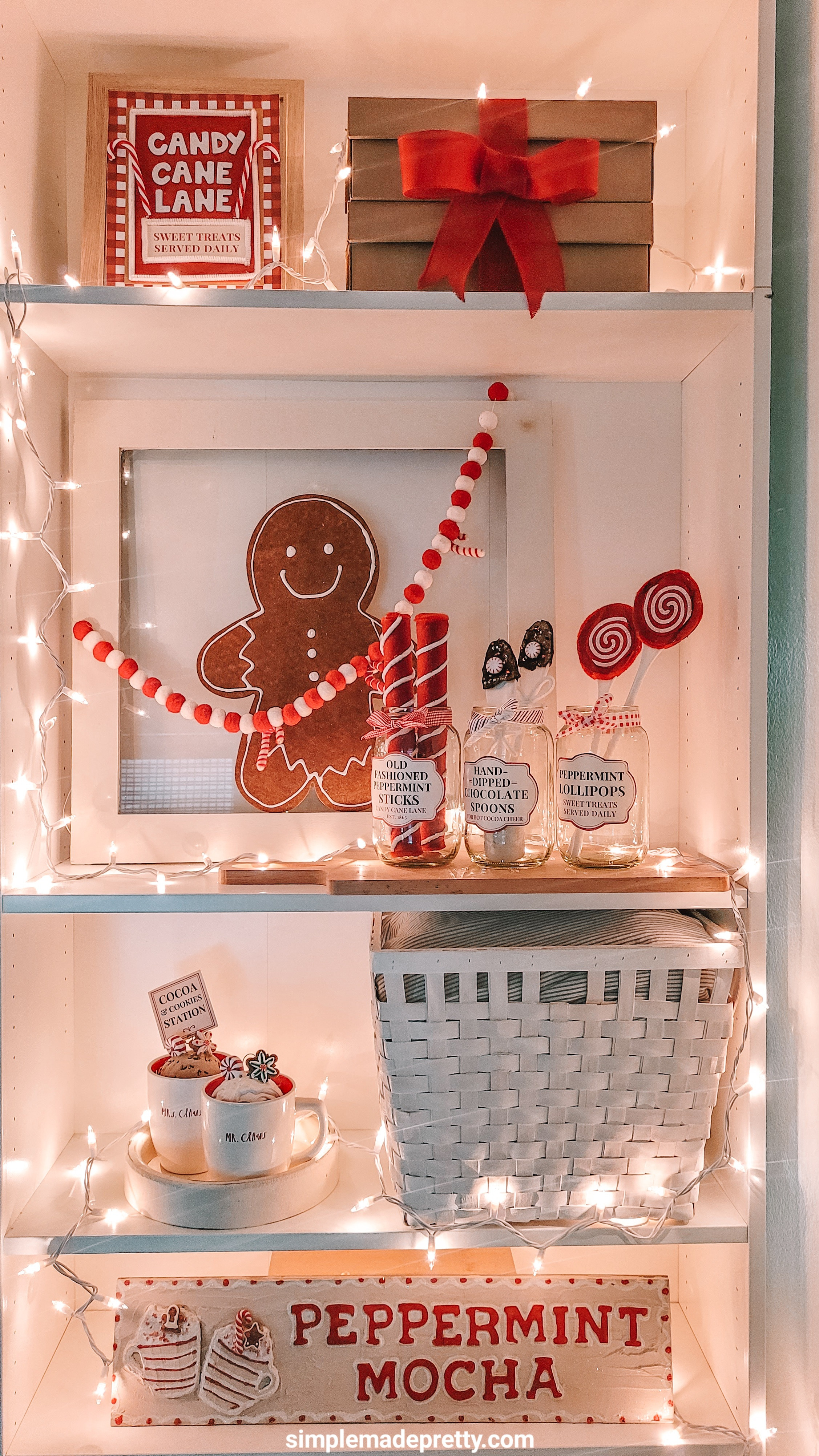 Peppermint mocha shelves 🍬🎄 Warm, cozy, twinkly… and everything is linked so you can recreate this festive little corner too!

#BookshelfStyling #ChristmasBookshelf #PeppermintLane #HolidayHome #LTKHolidayFinds 

 #LTKHoliday #LTKSeasonal #LTKHome