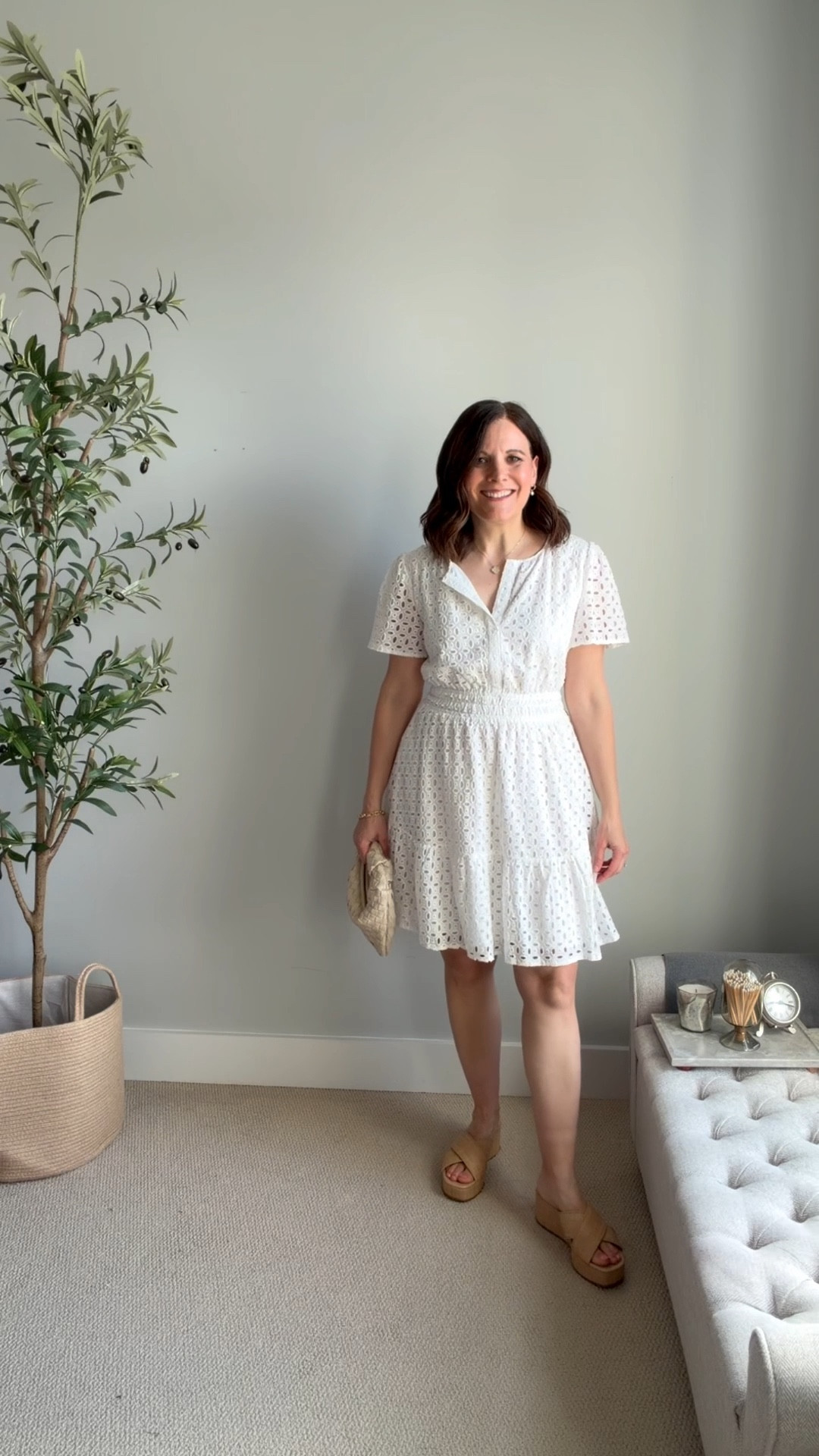 I’m thinking about wearing this Amazon dress to a nice family lunch on Good Friday. It’s one of my favorite dresses to wear when I want a spring look without wearing florals. Since it’s white, it’s easy to pair with a pastel-colored cardigan for a pop of color.
It has a notched neckline, short sleeves, and a defined waist, making it easy to wear and flattering on many body types. I’m wearing a medium because the large felt too big in the bust (I’m a 36B).


#LTKOver40 #LTKMidsize