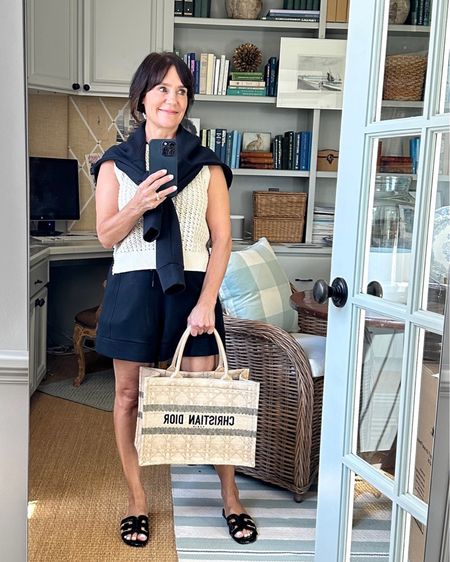 Real life MDW outfit! Love this Varley knit with my favorite shorts! The Sam Edelman Bay sandals in patent black look much more expensive than they are :)
Wearing xs top and sweater 
Small shorts 
Bag is Dior Book tote 

#LTKSeasonal #LTKstyletip #LTKfit