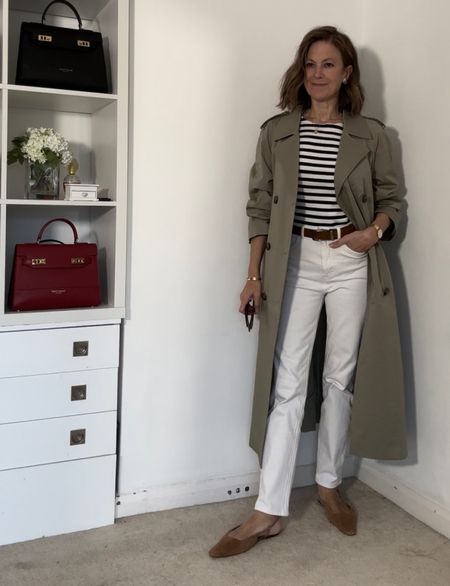 Spring outfit with a green trench coat and white jeans 

#LTKover40