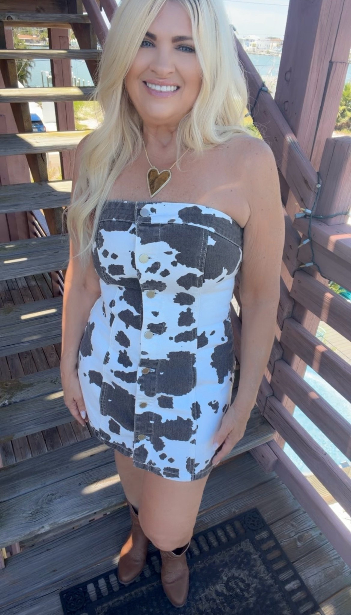 Cowhide print denim mini dress styled with low cowboy boots 🤎

Such a fun statement outfit for country concerts, vacations, girls’ nights, and summer events. One of those pieces that always gets compliments.

#LTKootd #LTKPetite #LTKOver40
