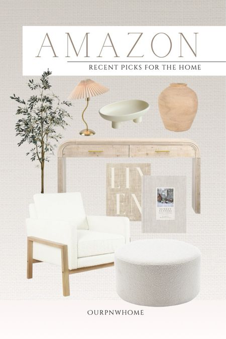 NEW Amazon spring home favorites!

modern console table, neutral console table, entryway table, boucle accent chair, white armchair, boucle ottoman, round ottoman, coffee table books, cookbooks, metal vase, neutral home, Amazon home, modern traditional home, table lamp, fruit bowl, decorative bowl, home decor, faux olive tree

#LTKStyleTip #LTKHome #LTKSeasonal