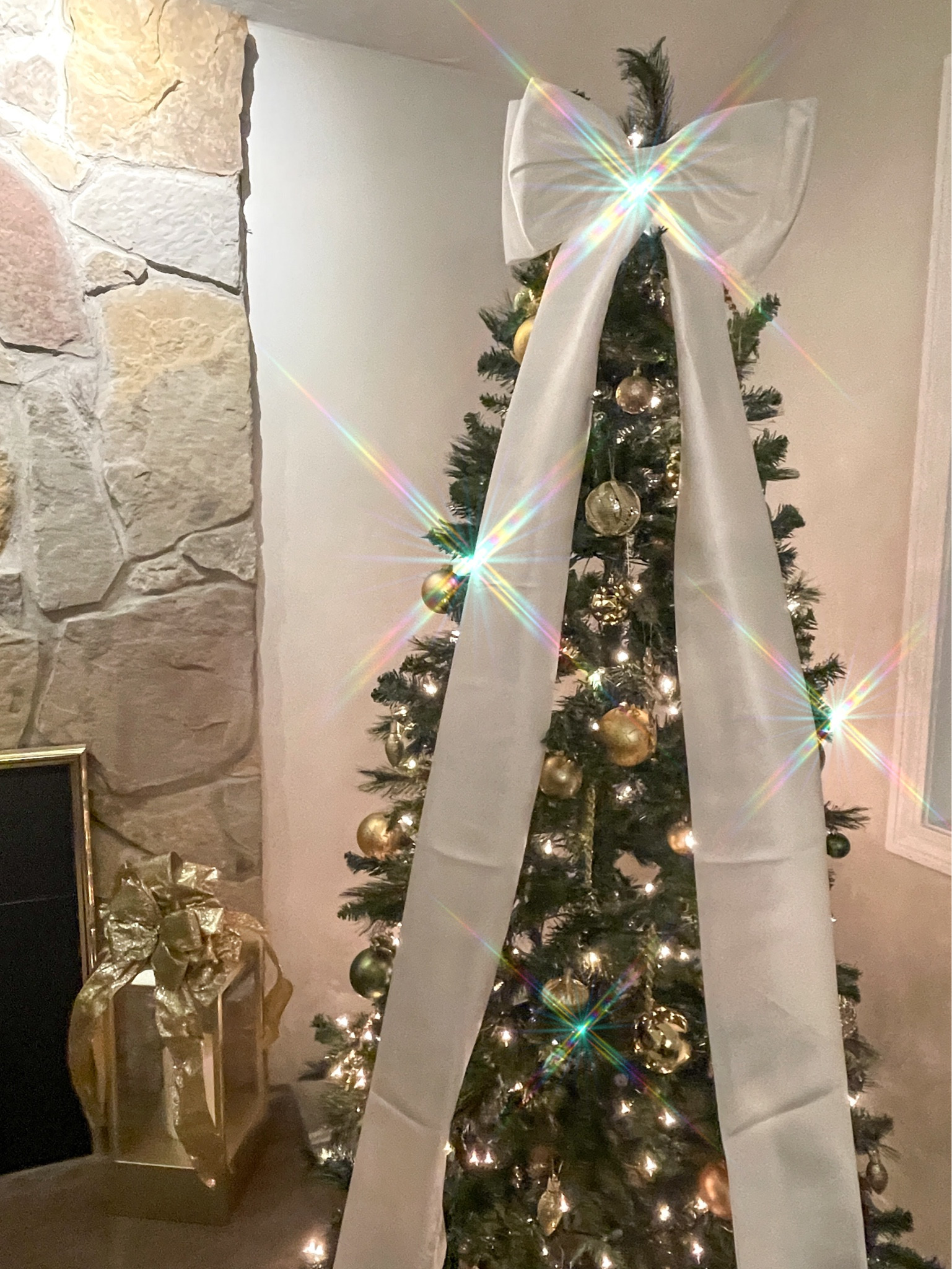 I did the viral Christmas Tree bow this year! I couldn’t be happier with how this looks. I was wondering how everyone found a bow this giant and I ended up finding a bow for a dress on Amazon! I attached it with string in the back! 

#LTKSeasonal #LTKHome #LTKHoliday