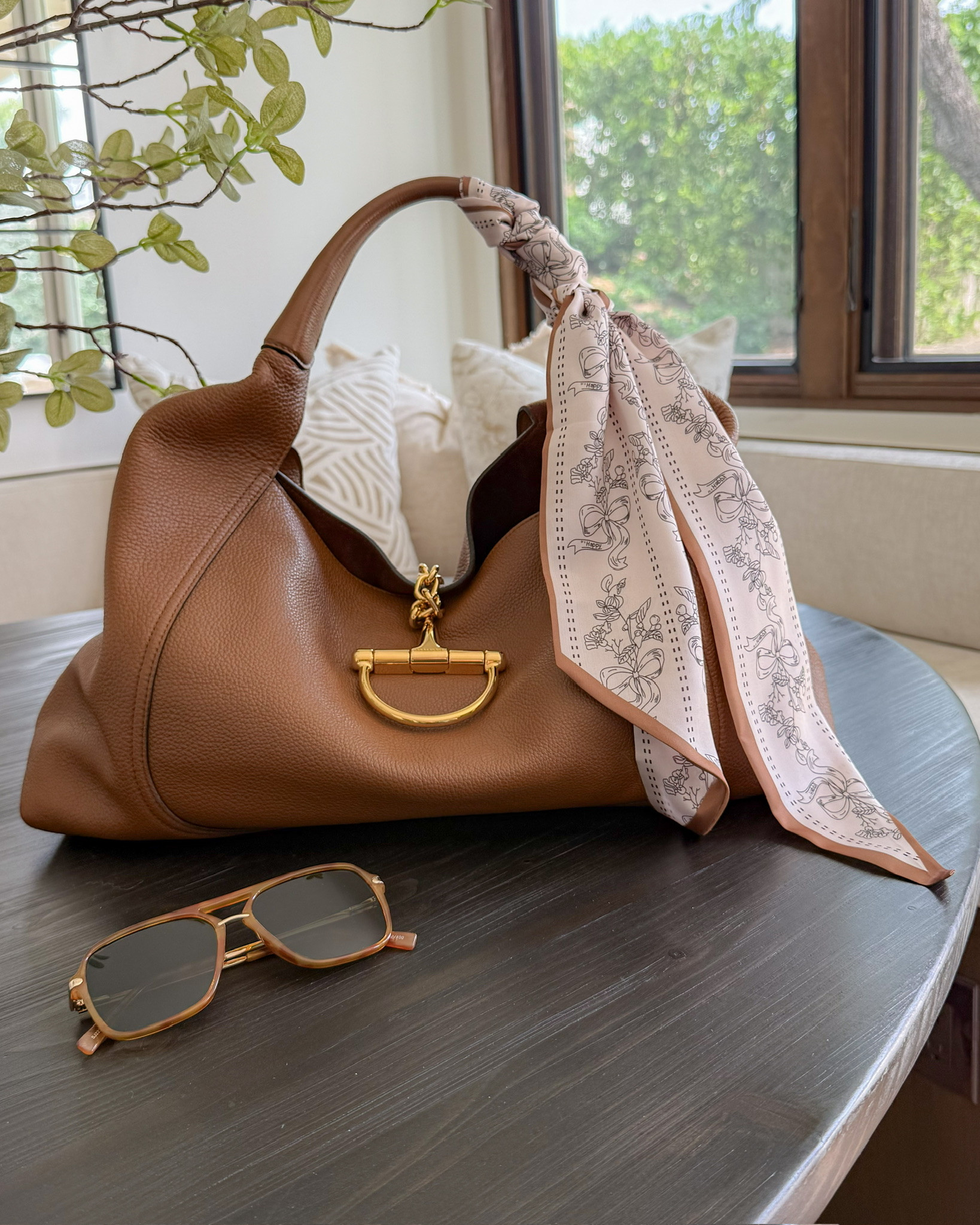 Loving this accessory for spring! Also this bag is a 10/10 and worth every penny. It fits SO much!

#LTKSeasonal #LTKootd #LTKgrwm