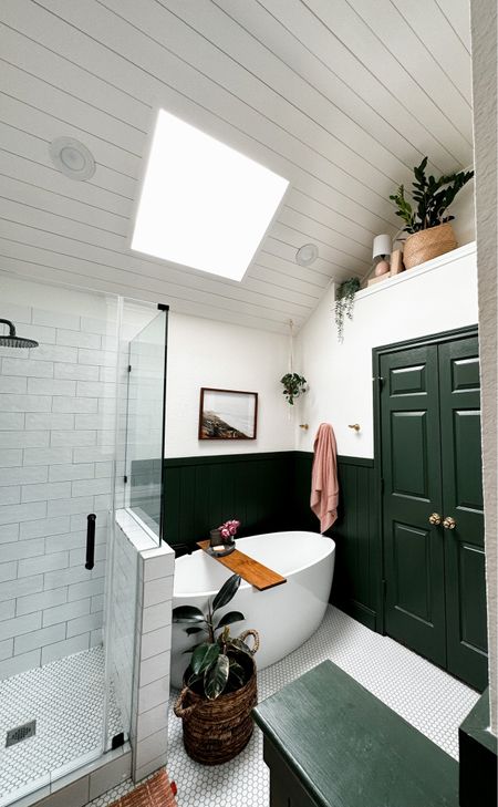 Designing the shiplap ceiling around that skylight was a challenge but we love how it turned out. We used slim lattice trim and it was the perfect low-profile look. From our green shiplap primary bathroom in our Texas house! 



#LTKhome