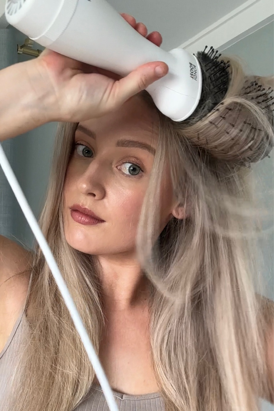 How I do my quick blow out. Under 10 mins with thick, long hair and gives a smooth, blow out look. 

