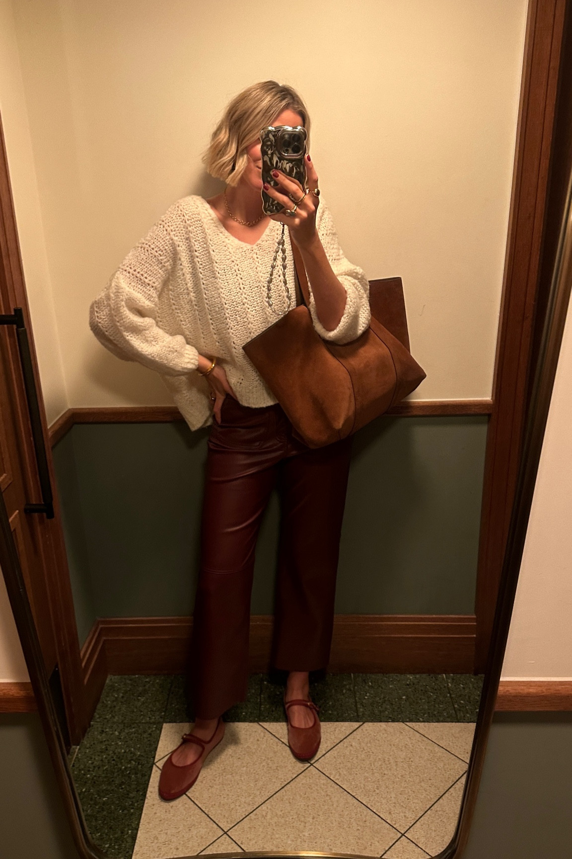 Burgundy 
Leather trousers 
Suede bag


#LTKuk #LTKeurope #LTKautumn