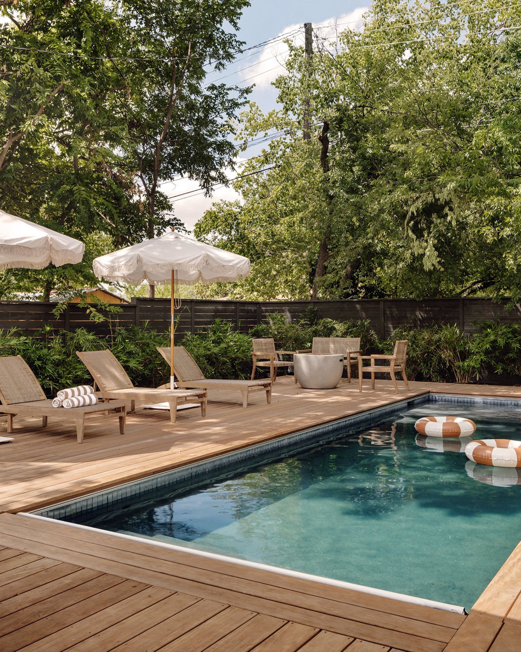 Dreamy Backyard Pool Oasis with Natural Wood Decking

#LTKcasa #LTKfamily