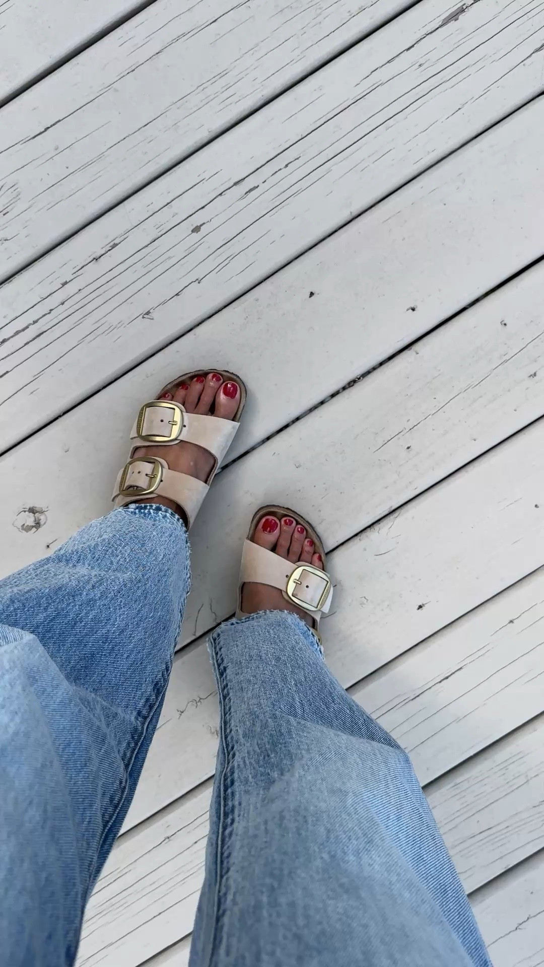 @Birkenstock US Big buckle Arizona sandals have been s closet staple for me for over 3 years now. Suede nubuck straps. True to size. New red polish also from Birkenstock. 
Bowed jeans from @Pistola Denim true to size.

#LTKOver40 #LTKTravel