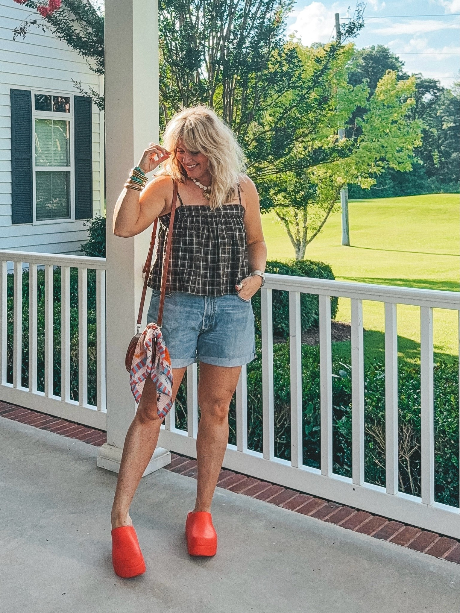This top is Aerie and so CUTE! I’m wearing my hubby’s old jeans I cut off. They are Levi’s. I size down one in these Crocs and love them!!  
👉🏼Save on 💛 necklace with code MANDIE @kcchicdesigns

#LTKootd #LTKOver40
